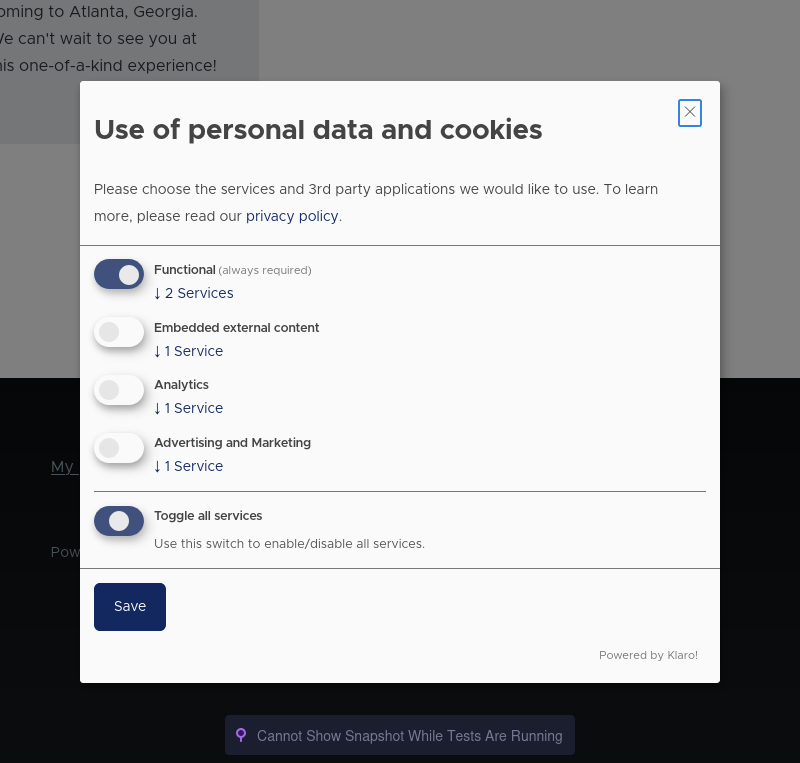 A cookie consent management modal displaying options for enabling or disabling functional, analytics, embedded external content, and advertising & marketing cookies. A “Save” button is visible at the bottom, and the modal is powered by Klaro.